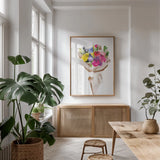 Happy Flowers by Mercedes Lopez Charro. shown as a print in a natural wood frame in a dining room. Available as a archival giclee rolled canvas, fine art paper, or poster print. SKU 72145h.