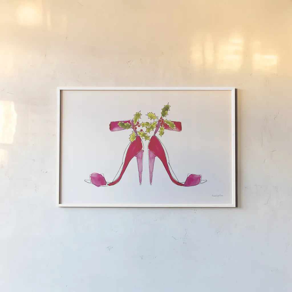 Holiday Stiletto Pair by Mercedes Lopez Charro. shown as a paper print in a white frame. Available as a archival giclee rolled canvas, fine art paper, or poster print. SKU 67982i.