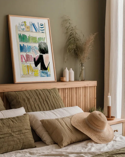 Home Library II by Mercedes Lopez Charro. shown as a paper print in a natural frame. Available as a archival giclee rolled canvas, fine art paper, or poster print. SKU 98647h.