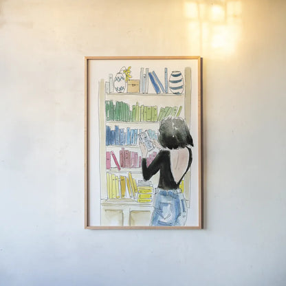 Home Library II by Mercedes Lopez Charro. shown as a paper print in a natural frame. Available as a archival giclee rolled canvas, fine art paper, or poster print. SKU 98647h.
