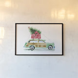 Home for Christmas by Mercedes Lopez Charro. shown as a paper print in a black flame. Available as a archival giclee rolled canvas, fine art paper, or poster print. SKU 89233i.