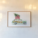 Home for Christmas by Mercedes Lopez Charro. shown as a paper print in a natural frame. Available as a archival giclee rolled canvas, fine art paper, or poster print. SKU 89233i.