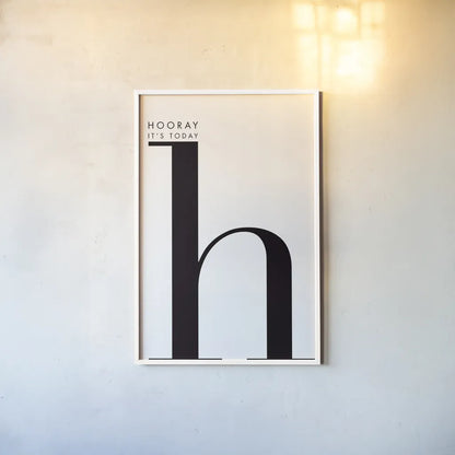 Hooray for H on White by Mercedes Lopez Charro. shown as a paper print in a white frame. Available as a archival giclee rolled canvas, fine art paper, or poster print. SKU 64149h.