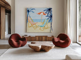 Laguna Lounging I by Mercedes Lopez Charro. Shown as extra-large giant wall art in a modern living room. Available as an archival giclee rolled canvas, fine art paper, or poster print. SKU 82207a.