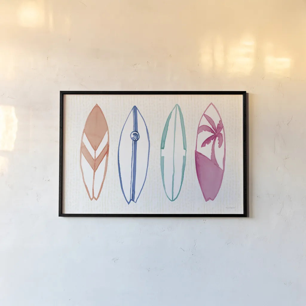 Laguna Surfboards I by Mercedes Lopez Charro. shown as a paper print in a black flame. Available as a archival giclee rolled canvas, fine art paper, or poster print. SKU 82213i.