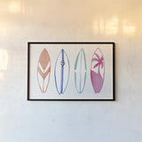Laguna Surfboards I by Mercedes Lopez Charro. shown as a paper print in a black flame. Available as a archival giclee rolled canvas, fine art paper, or poster print. SKU 82213i.