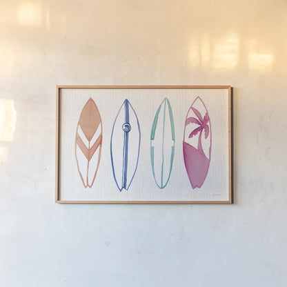 Laguna Surfboards I by Mercedes Lopez Charro. shown as a paper print in a natural frame. Available as a archival giclee rolled canvas, fine art paper, or poster print. SKU 82213i.