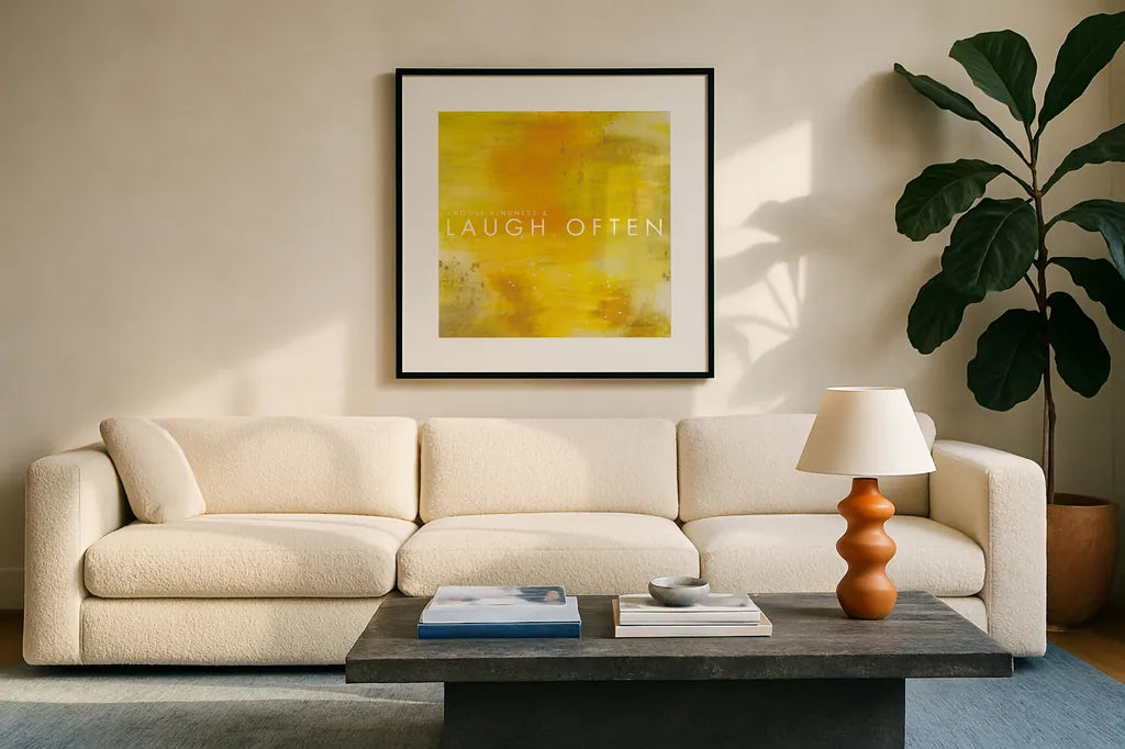 Laugh Often by Mercedes Lopez Charro. Displayed in a glass frame with matte in a clean modern living room. Available as an archival giclee rolled canvas, fine art paper, or poster print. SKU 67816a.