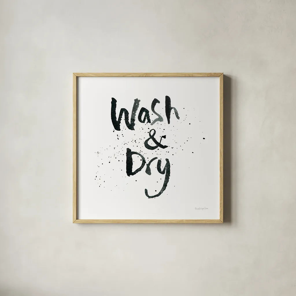 Laundry Day I by Mercedes Lopez Charro. Shown in a natural wood glass frame for a timeless modern aesthetic. Available as an archival giclee rolled canvas, fine art paper, or poster print. SKU 75484a.