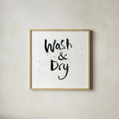 Laundry Day I by Mercedes Lopez Charro. Shown in a natural wood glass frame for a timeless modern aesthetic. Available as an archival giclee rolled canvas, fine art paper, or poster print. SKU 75484a.