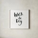 Laundry Day I by Mercedes Lopez Charro. Shown in a crisp white glass frame for a clean and minimalist style. Available as an archival giclee rolled canvas, fine art paper, or poster print. SKU 75484a.