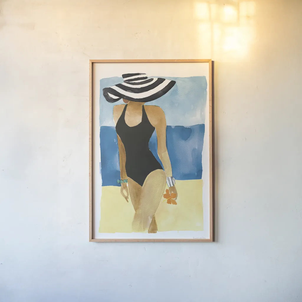 Mallorca Girl One Piece by Mercedes Lopez Charro. shown as a paper print in a natural frame. Available as a archival giclee rolled canvas, fine art paper, or poster print. SKU 98157h.