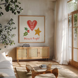 Merry Everything II Script by Mercedes Lopez Charro. Shown in a natural wood frame in a cozy modern living room. Available as an archival giclee rolled canvas, fine art paper, or poster print. SKU 79962a.
