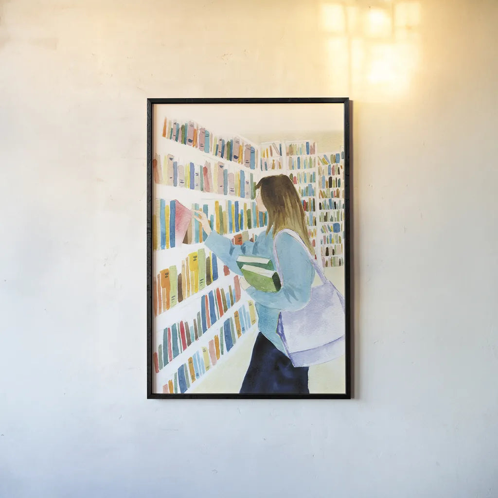 Never Enough Books II by Mercedes Lopez Charro. shown as a paper print in a black flame. Available as a archival giclee rolled canvas, fine art paper, or poster print. SKU 98645h.