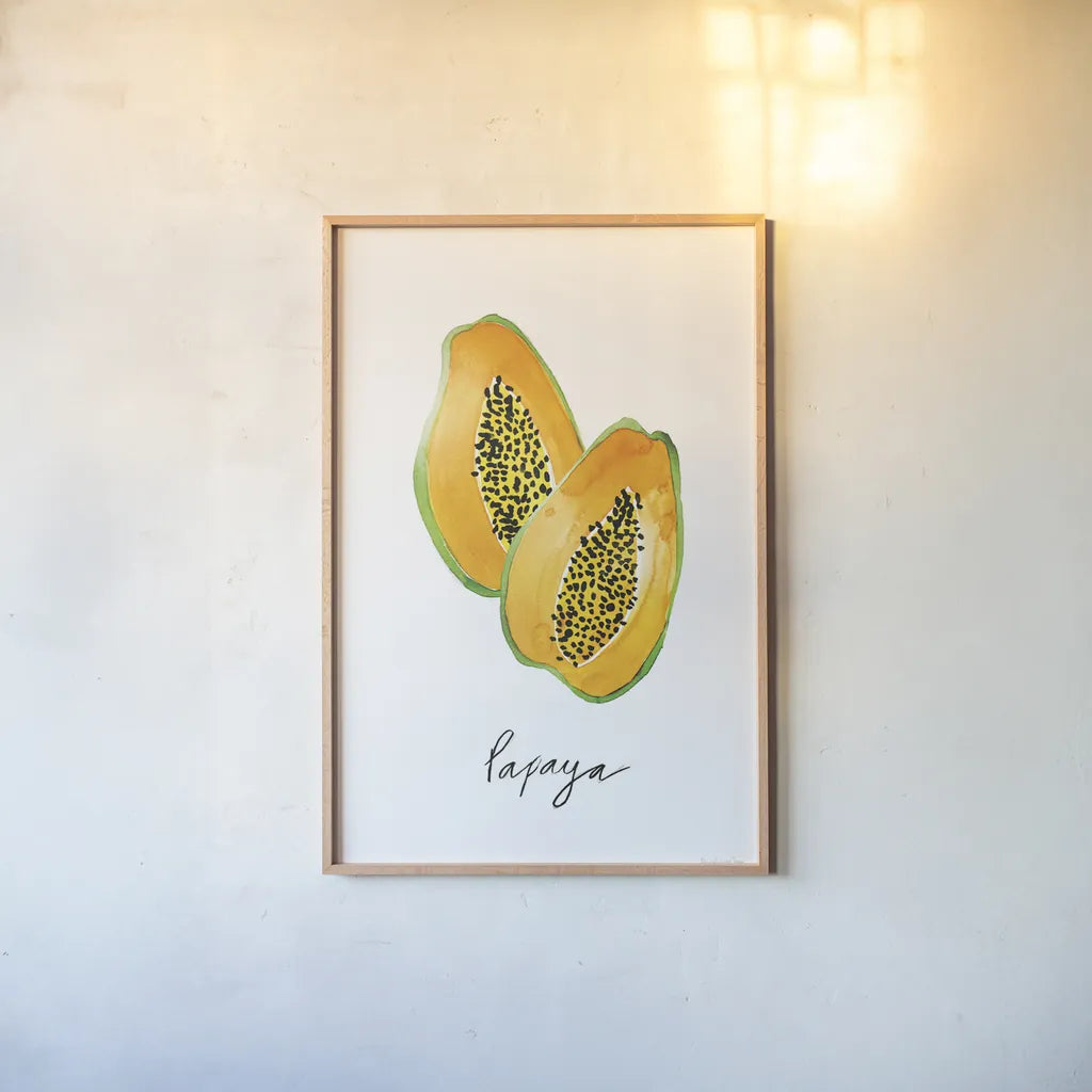 Papayas by Mercedes Lopez Charro. shown as a paper print in a natural frame. Available as a archival giclee rolled canvas, fine art paper, or poster print. SKU 67133h.