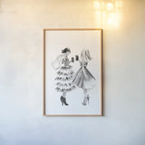 Paris Girlfriends II BW by Mercedes Lopez Charro. shown as a paper print in a natural frame. Available as a archival giclee rolled canvas, fine art paper, or poster print. SKU 79094h.