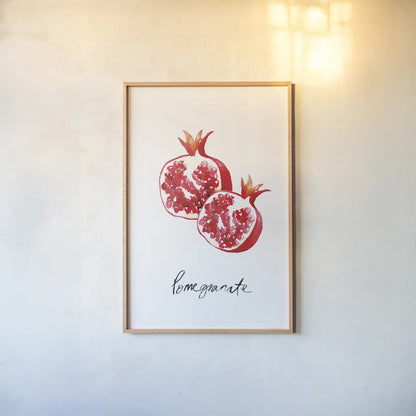 Pomegranates by Mercedes Lopez Charro. shown as a paper print in a natural frame. Available as a archival giclee rolled canvas, fine art paper, or poster print. SKU 67134h.
