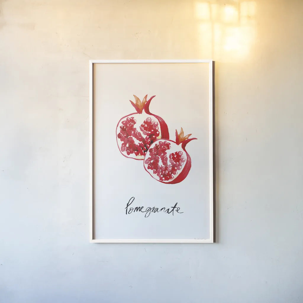 Pomegranates by Mercedes Lopez Charro. shown as a paper print in a white frame. Available as a archival giclee rolled canvas, fine art paper, or poster print. SKU 67134h.