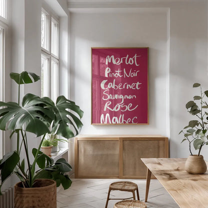 Pop the Cork Wine Words I by Mercedes Lopez Charro. shown as a print in a natural wood frame in a dining room. Available as a archival giclee rolled canvas, fine art paper, or poster print. SKU 77324h.