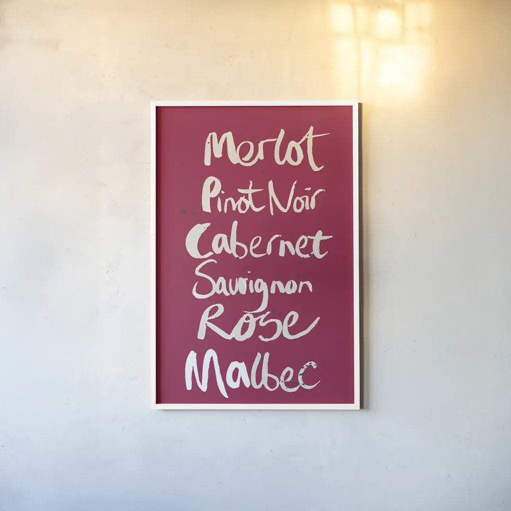 Pop the Cork Wine Words I by Mercedes Lopez Charro. shown as a paper print in a white frame. Available as a archival giclee rolled canvas, fine art paper, or poster print. SKU 77324h.