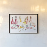 Pop the Cork XI by Mercedes Lopez Charro. shown as a paper print in a black flame. Available as a archival giclee rolled canvas, fine art paper, or poster print. SKU 74964i.