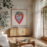 Sacred Heart III by Mercedes Lopez Charro. Shown in a natural wood frame in a cozy modern living room. Available as an archival giclee rolled canvas, fine art paper, or poster print. SKU 82859a.