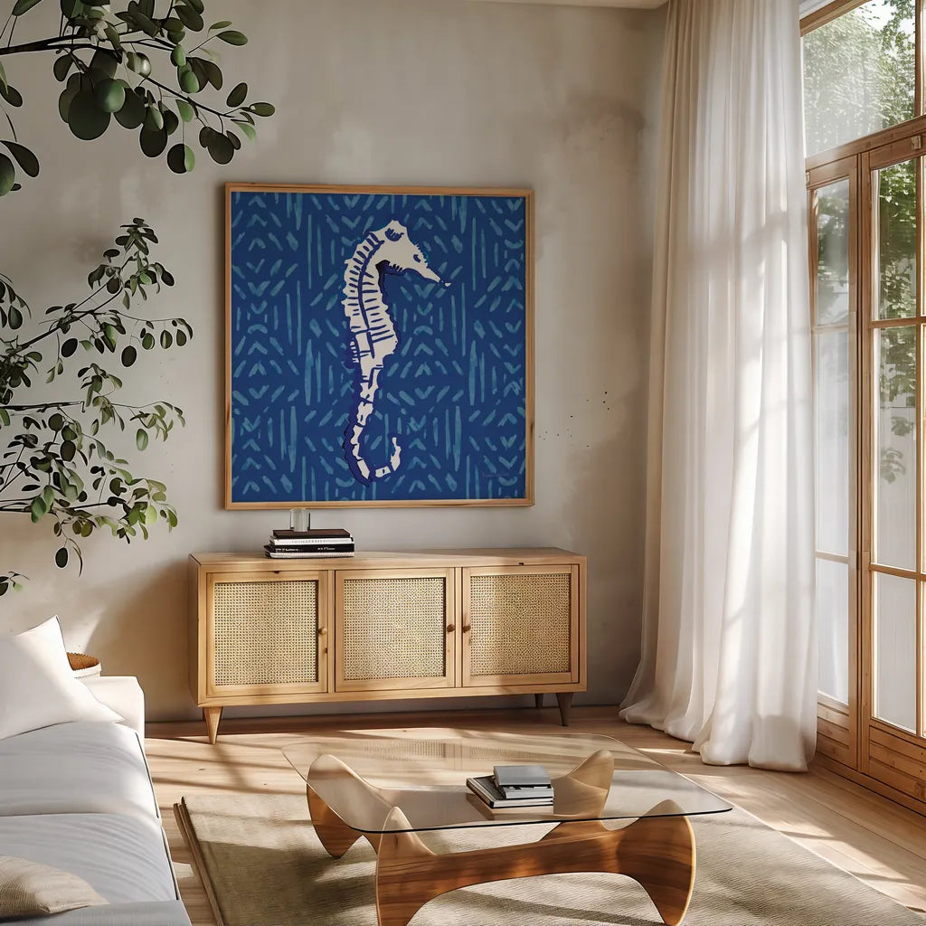 Salty Waves IX by Mercedes Lopez Charro. Shown in a natural wood frame in a cozy modern living room. Available as an archival giclee rolled canvas, fine art paper, or poster print. SKU 78680a.