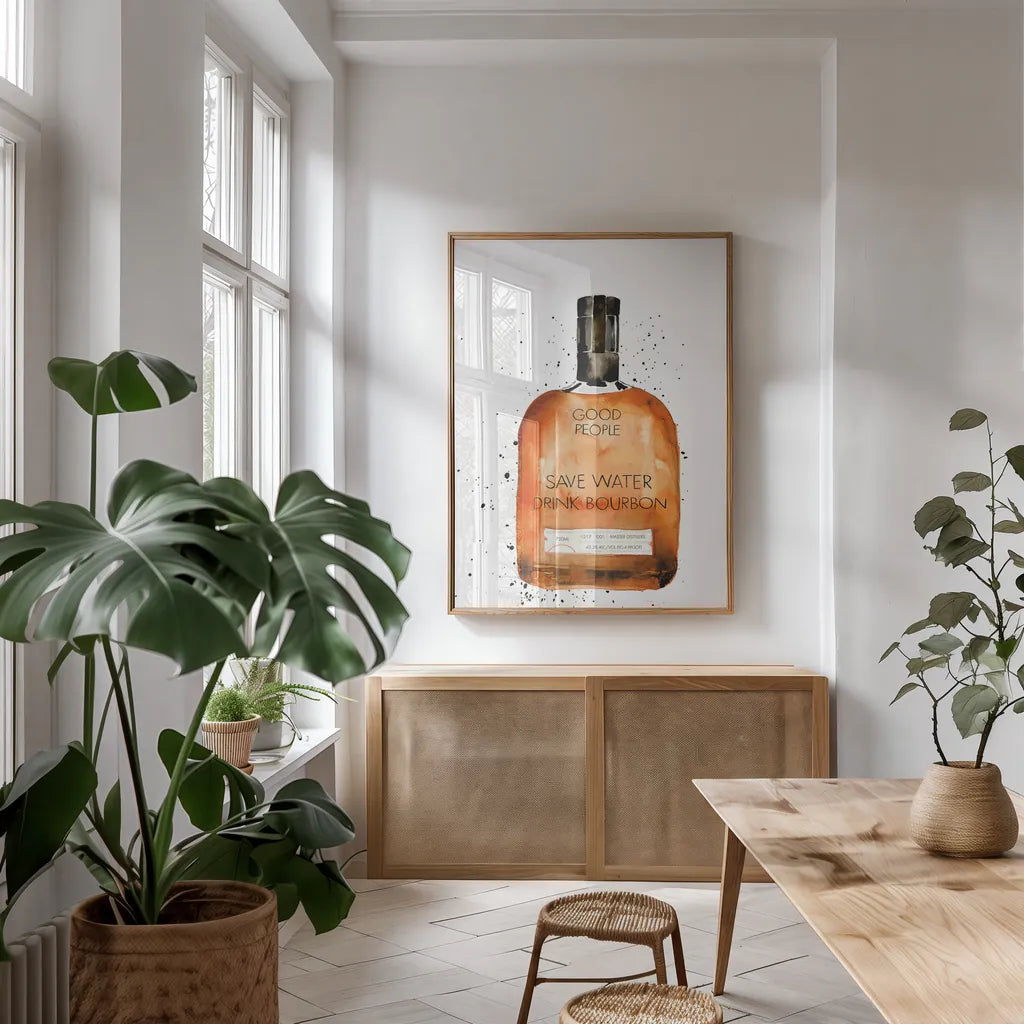 Save Water Drink Bourbon by Mercedes Lopez Charro. shown as a print in a natural wood frame in a dining room. Available as a archival giclee rolled canvas, fine art paper, or poster print. SKU 66450h.