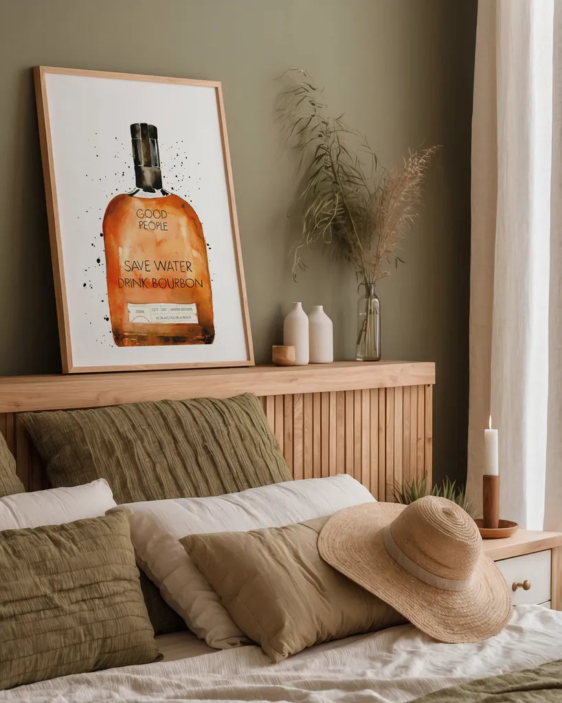 Save Water Drink Bourbon by Mercedes Lopez Charro. shown as a paper print in a natural frame. Available as a archival giclee rolled canvas, fine art paper, or poster print. SKU 66450h.