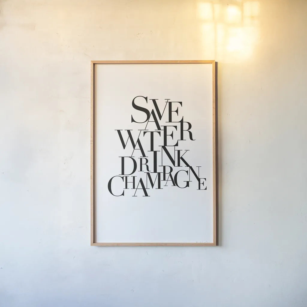 Save Water Drink Champagne by Mercedes Lopez Charro. shown as a paper print in a natural frame. Available as a archival giclee rolled canvas, fine art paper, or poster print. SKU 66613h.