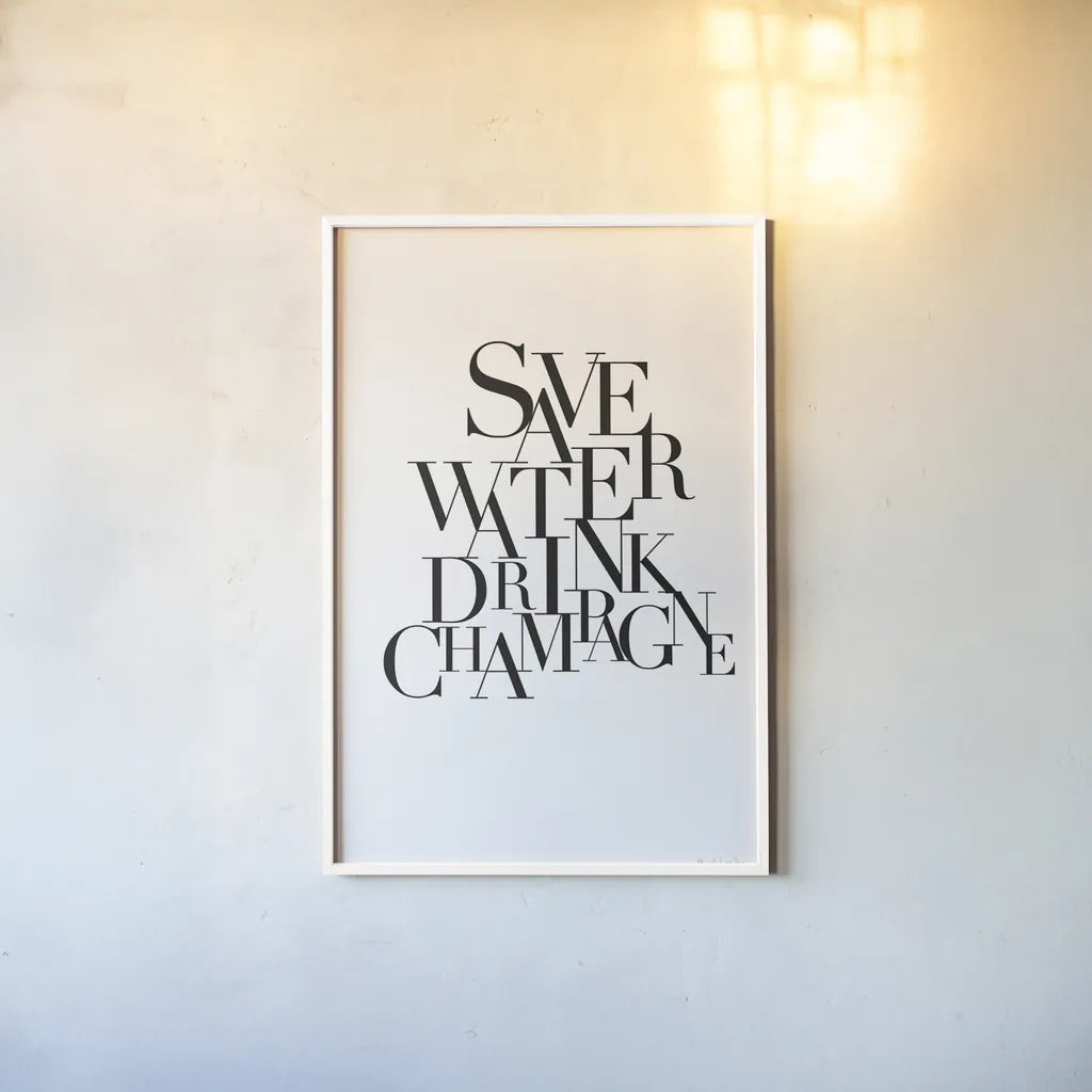 Save Water Drink Champagne by Mercedes Lopez Charro. shown as a paper print in a white frame. Available as a archival giclee rolled canvas, fine art paper, or poster print. SKU 66613h.