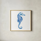 Seahorse by Mercedes Lopez Charro. Shown in a natural wood glass frame for a timeless modern aesthetic. Available as an archival giclee rolled canvas, fine art paper, or poster print. SKU 69376a.