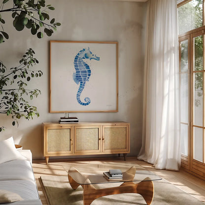 Seahorse by Mercedes Lopez Charro. Shown in a natural wood frame in a cozy modern living room. Available as an archival giclee rolled canvas, fine art paper, or poster print. SKU 69376a.
