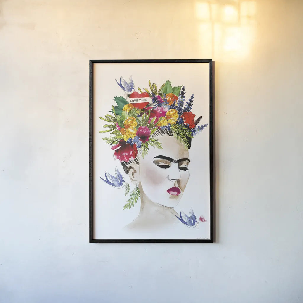 She is Frida by Mercedes Lopez Charro. shown as a paper print in a black flame. Available as a archival giclee rolled canvas, fine art paper, or poster print. SKU 68092h.