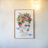 She is Frida by Mercedes Lopez Charro. shown as a paper print in a natural frame. Available as a archival giclee rolled canvas, fine art paper, or poster print. SKU 68092h.
