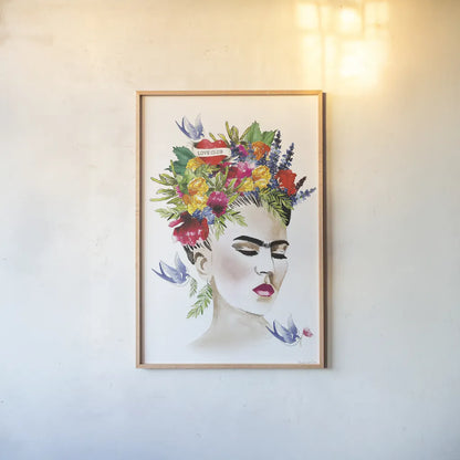 She is Frida by Mercedes Lopez Charro. shown as a paper print in a natural frame. Available as a archival giclee rolled canvas, fine art paper, or poster print. SKU 68092h.