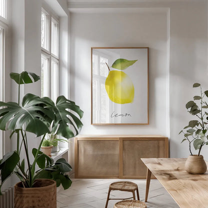 Single Lemon by Mercedes Lopez Charro. shown as a print in a natural wood frame in a dining room. Available as a archival giclee rolled canvas, fine art paper, or poster print. SKU 67136h.