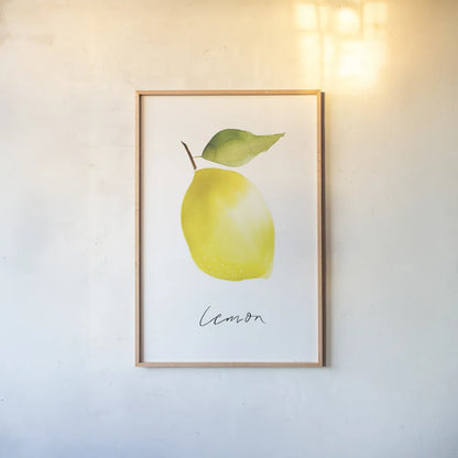 Single Lemon by Mercedes Lopez Charro. shown as a paper print in a natural frame. Available as a archival giclee rolled canvas, fine art paper, or poster print. SKU 67136h.