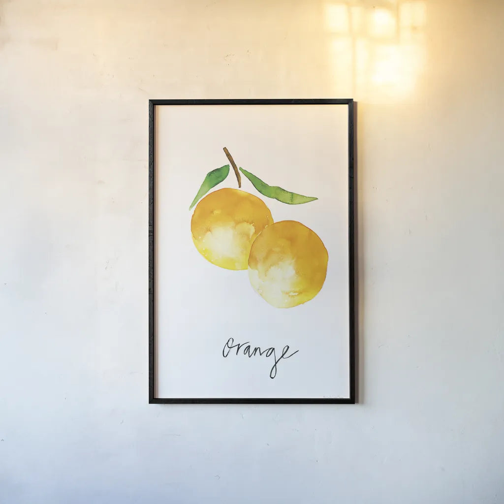 Single Orange by Mercedes Lopez Charro. shown as a paper print in a black flame. Available as a archival giclee rolled canvas, fine art paper, or poster print. SKU 67135h.