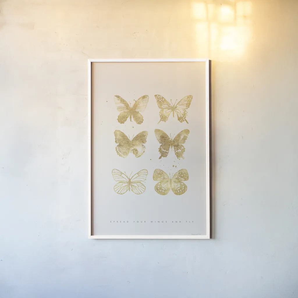Six Gold Butterflies by Mercedes Lopez Charro. shown as a paper print in a white frame. Available as a archival giclee rolled canvas, fine art paper, or poster print. SKU 74523h.
