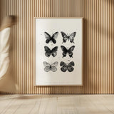 Six Inky Butterflies by Mercedes Lopez Charro. shown as over sized large wall art. Available as an archival giclee rolled canvas, fine art paper, or poster print. SKU 66612h.