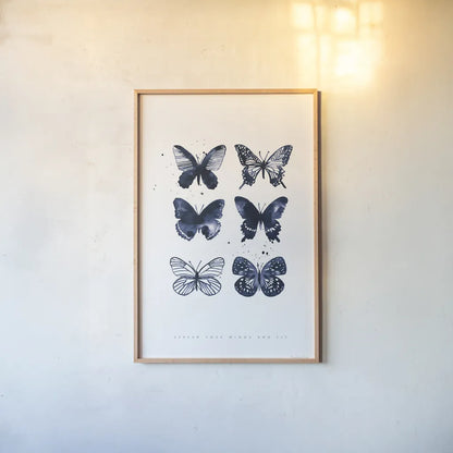 Six Inky Butterflies Blue by Mercedes Lopez Charro. shown as a paper print in a natural frame. Available as a archival giclee rolled canvas, fine art paper, or poster print. SKU 68239h.