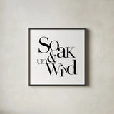 Soak and Unwind by Mercedes Lopez Charro. Shown in a sleek black glass frame for a contemporary gallery look. Available as an archival giclee rolled canvas, fine art paper, or poster print. SKU 75812a.