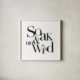 Soak and Unwind by Mercedes Lopez Charro. Shown in a crisp white glass frame for a clean and minimalist style. Available as an archival giclee rolled canvas, fine art paper, or poster print. SKU 75812a.
