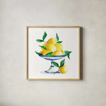 Spanish Lemons II by Mercedes Lopez Charro. Shown in a natural wood glass frame for a timeless modern aesthetic. Available as an archival giclee rolled canvas, fine art paper, or poster print. SKU 66361a.