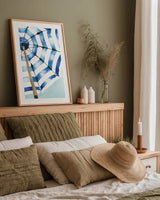 Surf and Sun I by Mercedes Lopez Charro. shown as a paper print in a natural frame. Available as a archival giclee rolled canvas, fine art paper, or poster print. SKU 70154h.