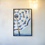 Surf and Sun I by Mercedes Lopez Charro. shown as a paper print in a black flame. Available as a archival giclee rolled canvas, fine art paper, or poster print. SKU 70154h.