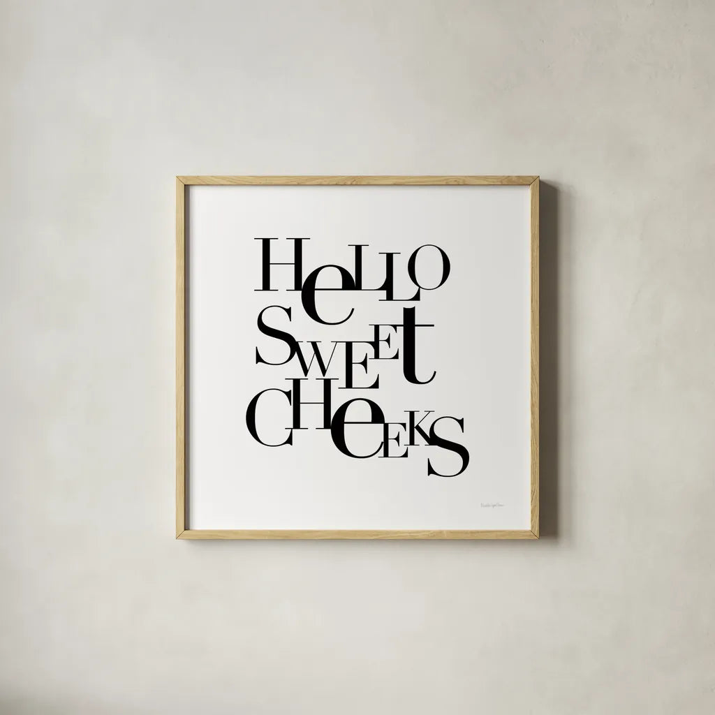 Sweet Cheeks by Mercedes Lopez Charro. Shown in a natural wood glass frame for a timeless modern aesthetic. Available as an archival giclee rolled canvas, fine art paper, or poster print. SKU 75814a.