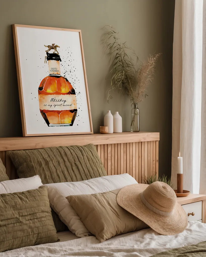 Whiskey is My Spirit Animal by Mercedes Lopez Charro. shown as a paper print in a natural frame. Available as a archival giclee rolled canvas, fine art paper, or poster print. SKU 66451h.