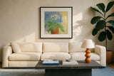 Cream Primula by Michael Clark. Displayed in a glass frame with matte in a clean modern living room. Available as an archival giclee rolled canvas, fine art paper, or poster print. SKU 8724a.